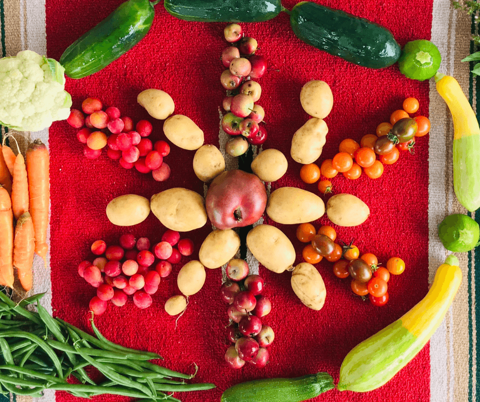 artistic table lay of fresh produce on a blanket
